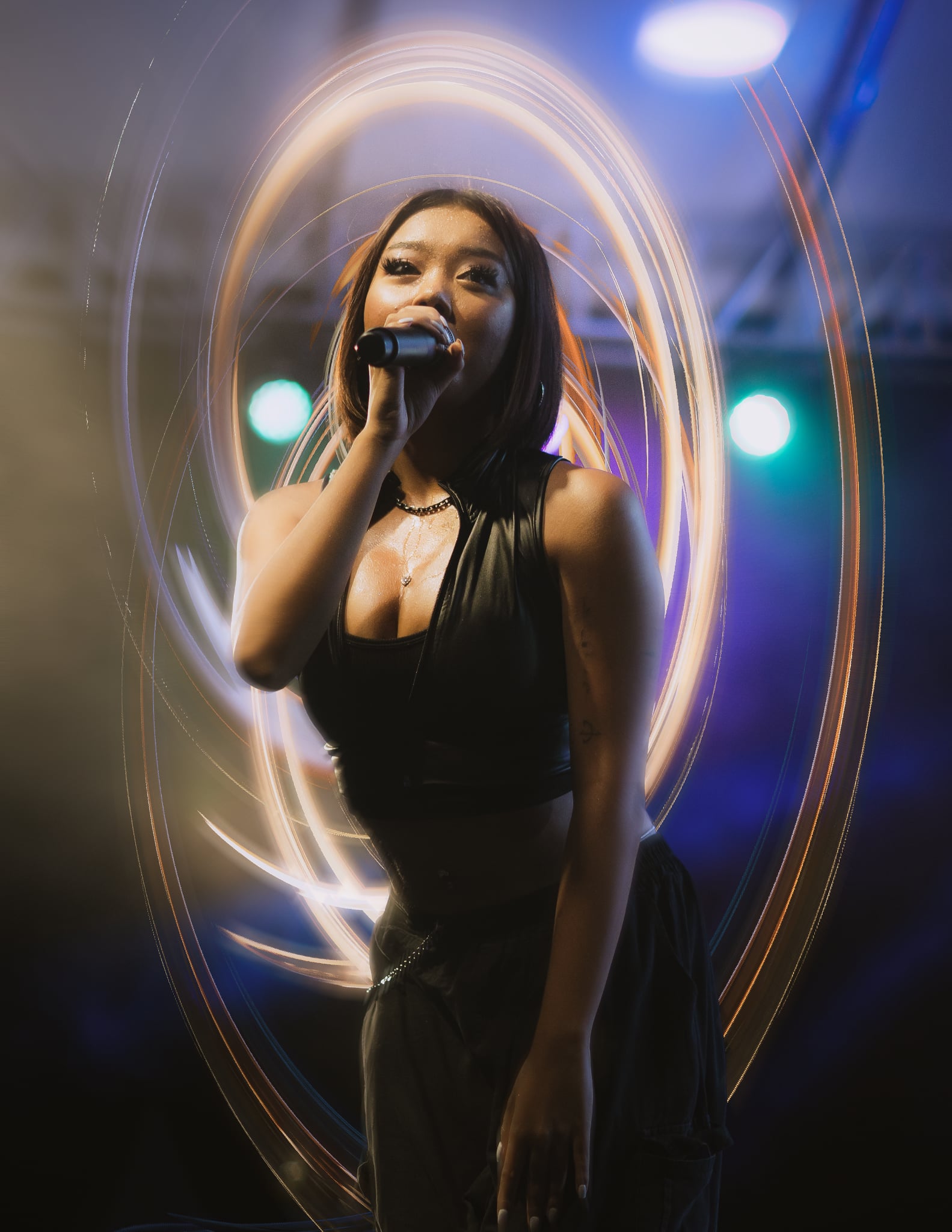 Female singer with light trail